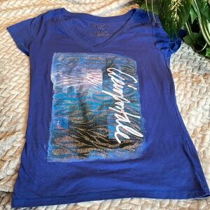 Aeropostale Ladies Size:Lg in Blue w glittery  graphic logo on front of Tee EUC